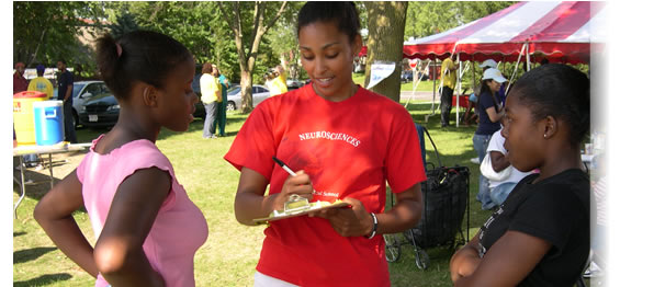 Medical student conducting a health survey in an underserved community in Madison, Wisconsin.  This program was organized through a partnership between the Allied Wellness Center and the Office of Community Service Programs at the UW School of Medicine and Public Health.  Website: http://www.med.wisc.edu/education/md/community-service/main/148